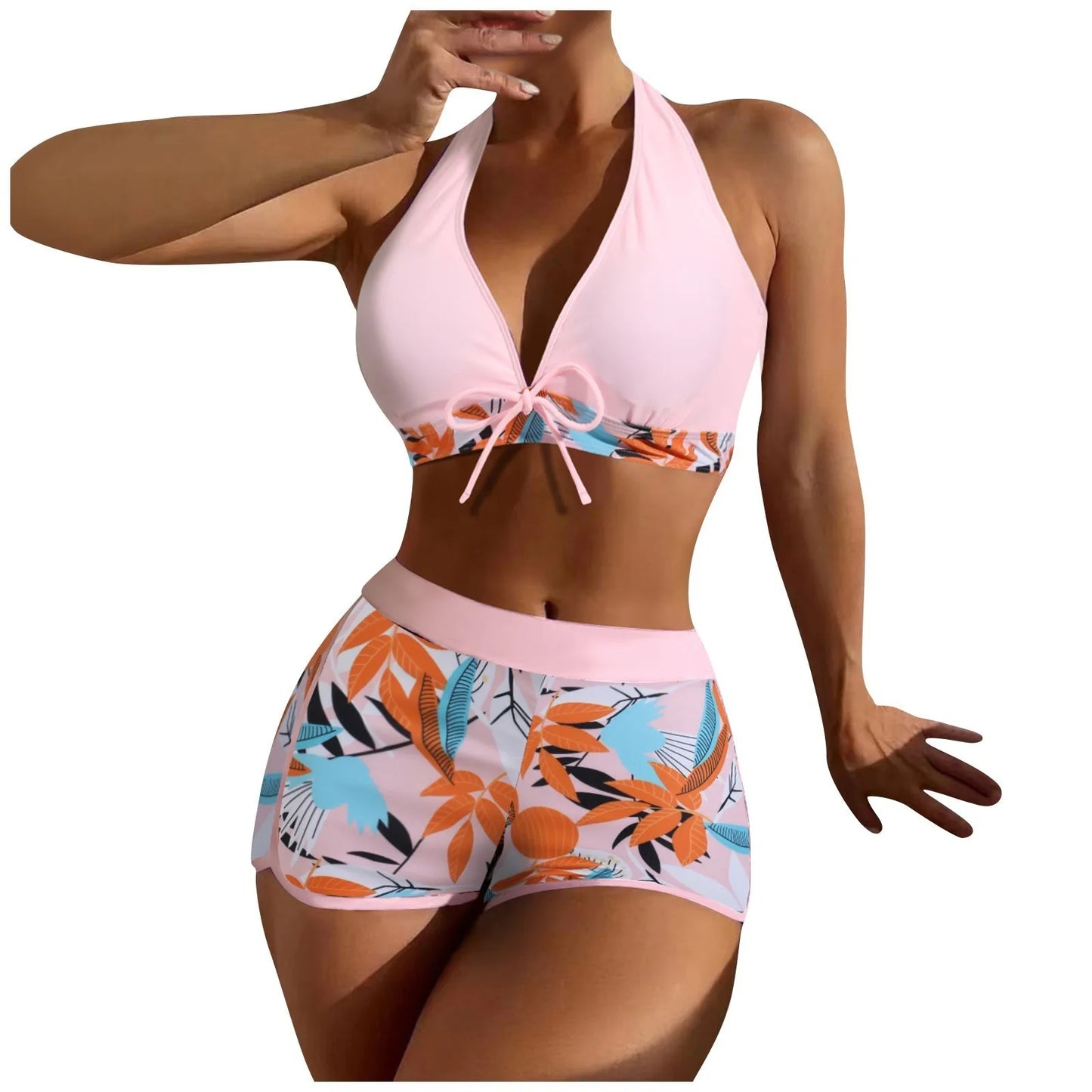 Woman wearing a High Waist Plant Print Bikini Set with tropical leaf pattern on a white background