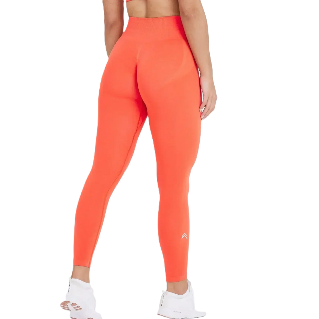 Bright orange leggings worn by a person on a white background