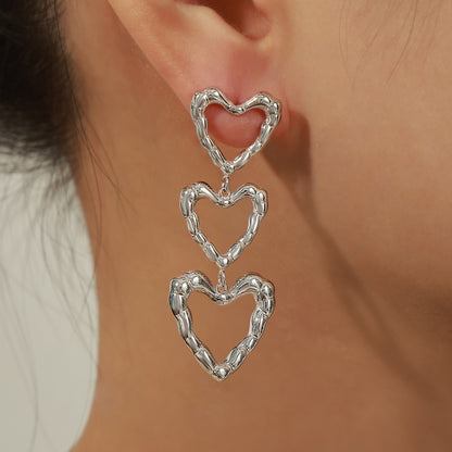 Titanium Steel Heart Earrings – Hypoallergenic & Stylish