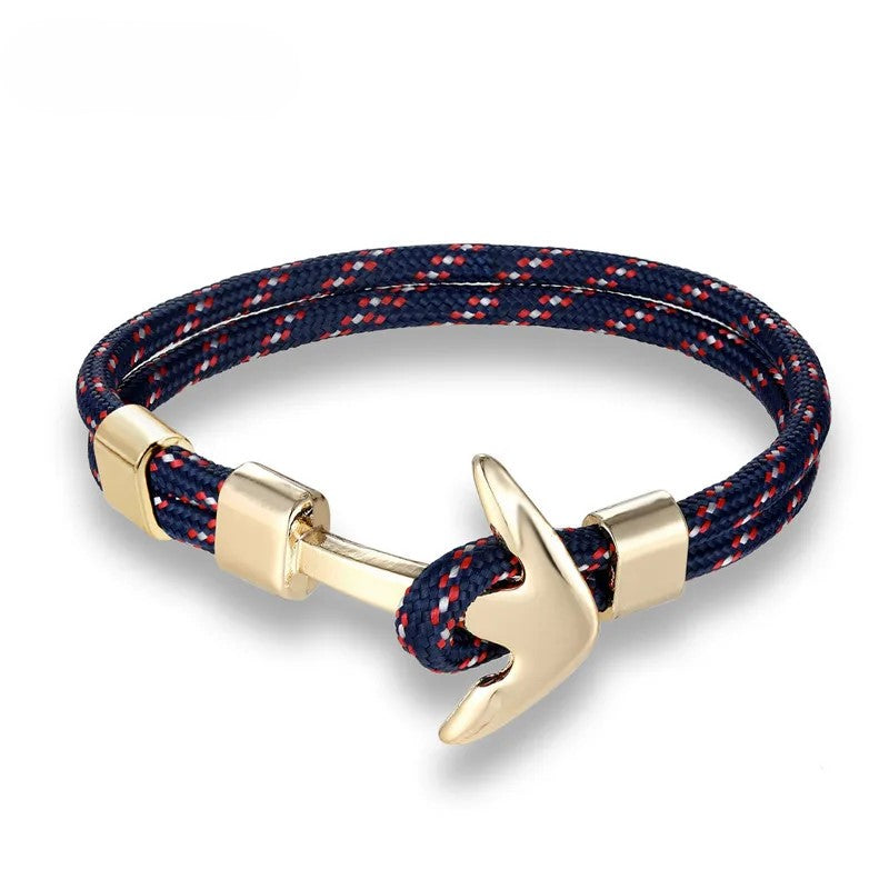 A stylish anchor bracelet crafted from vibrant blue and red rope, perfect for adding a nautical touch to any outfit.