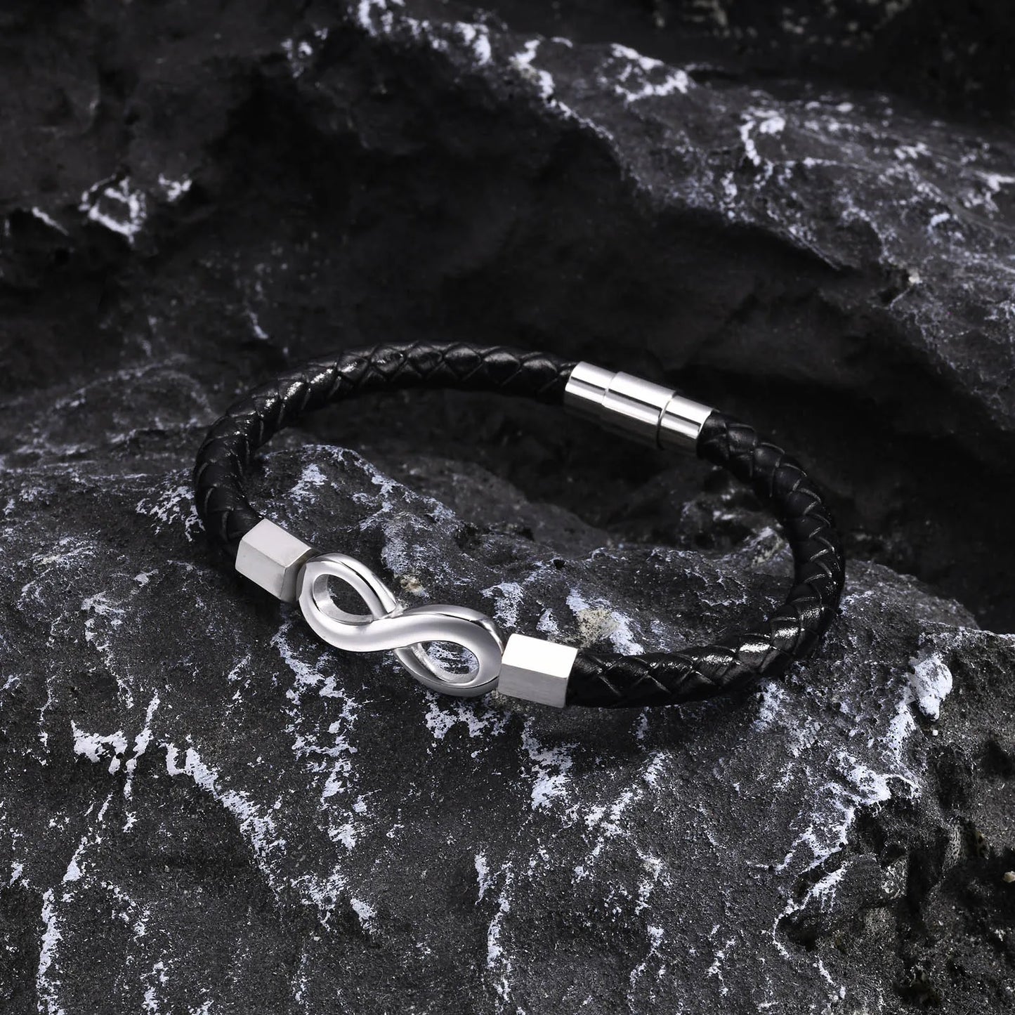 Elegant black leather bracelet adorned with an infinity symbol, representing eternal bonds and limitless possibilities.