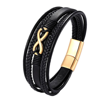 Elegant black leather bracelet adorned with a shiny gold clasp, combining sophistication and modern style effortlessly.