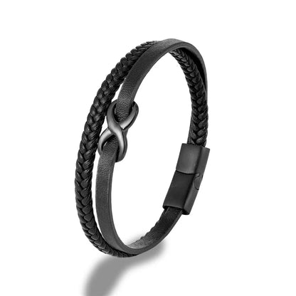 A stylish black bracelet adorned with a black clasp, showcasing an intricate Infinity Knot design on its surface