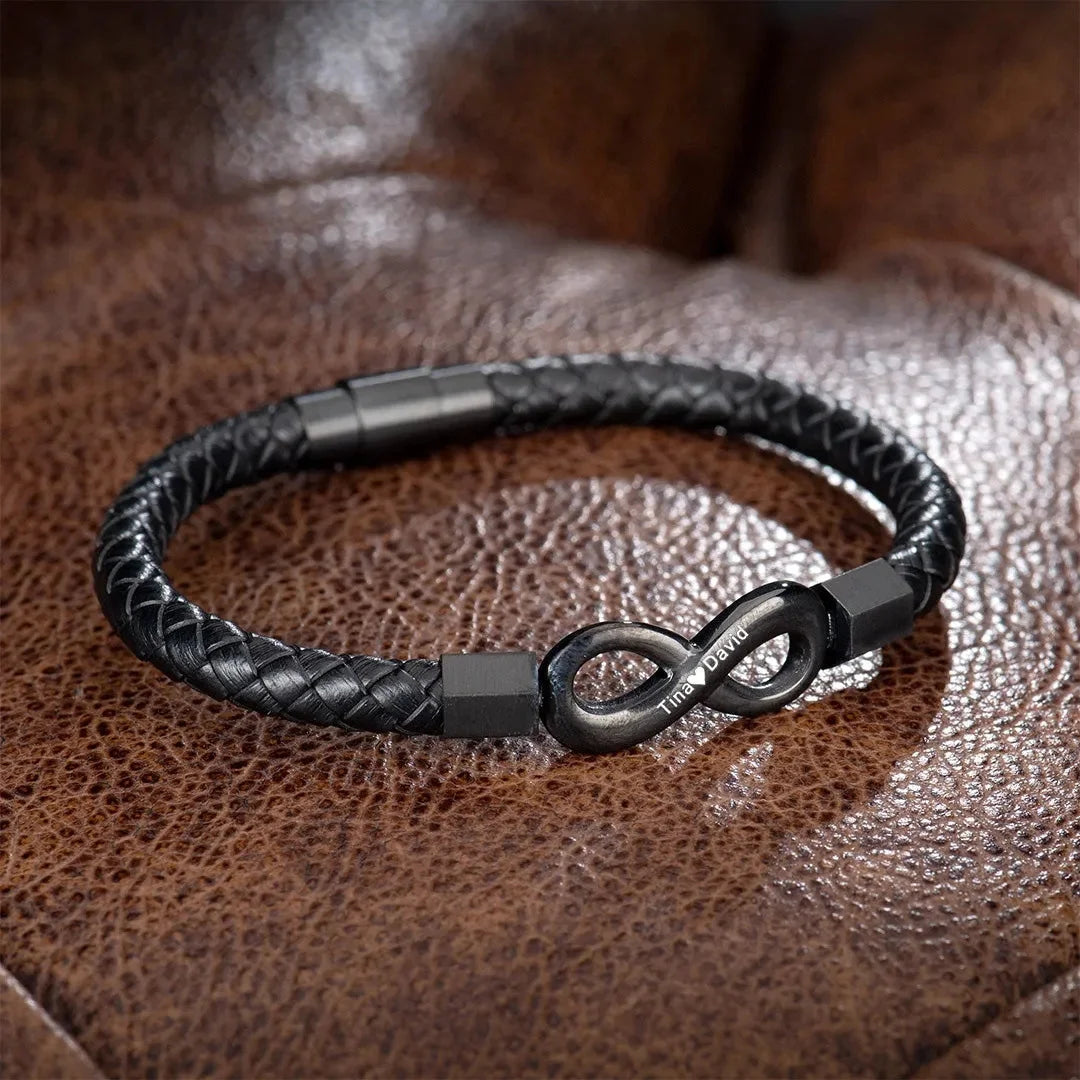 A black leather infinity bracelet elegantly crafted, symbolizing endless love and connection.