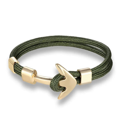 A vibrant green and gold anchor bracelet, perfect for adding a touch of maritime charm to any outfit.