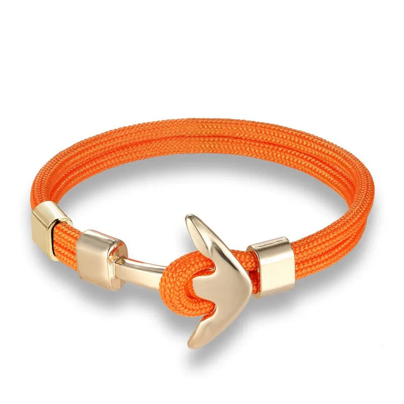 An orange rope bracelet featuring a stylish gold anchor charm, perfect for nautical-themed accessories.