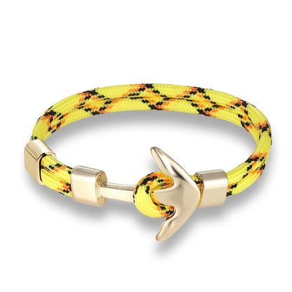 A vibrant yellow rope bracelet featuring a stylish anchor charm, perfect for nautical-themed accessories.