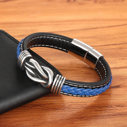 Elegant blue leather bracelet with a silver clasp, showcasing an infinity knot design for a unique accessory.