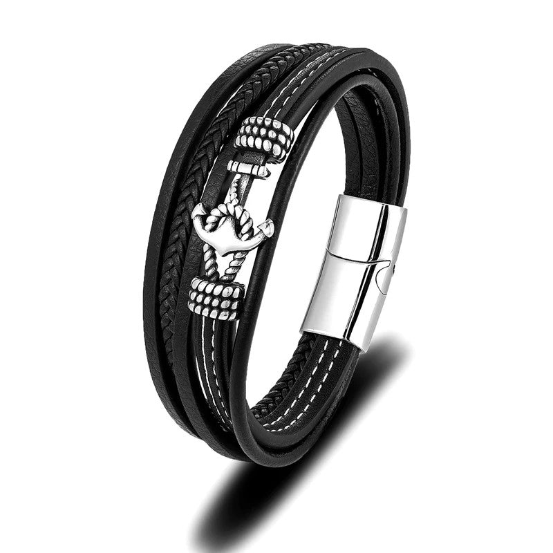 A chic black leather bracelet with a silver anchor, ideal for adding a touch of nautical flair to any outfit.