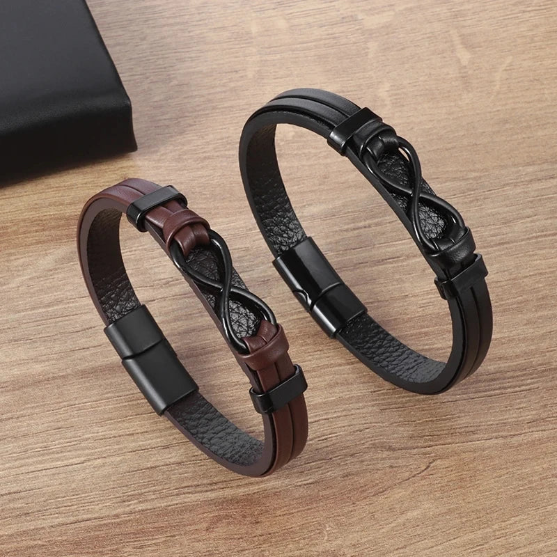 Two leather bracelets featuring an infinity symbol, representing eternal love and connection, elegantly displayed together.