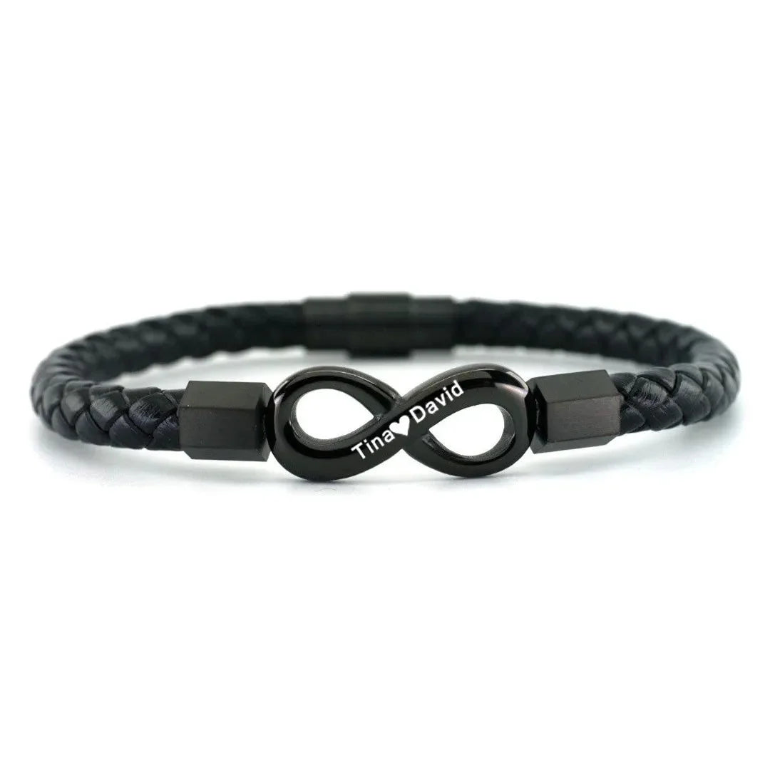 A black leather bracelet featuring a silver infinity symbol, symbolizing eternal love and connection.