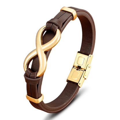  A brown leather bracelet featuring a stylish gold clasp, showcasing a blend of elegance and casual sophistication.