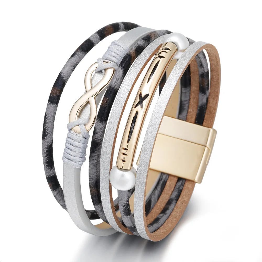 A multi-layer leopard PU leather bracelet featuring an infinity symbol, showcasing a stylish and unique design