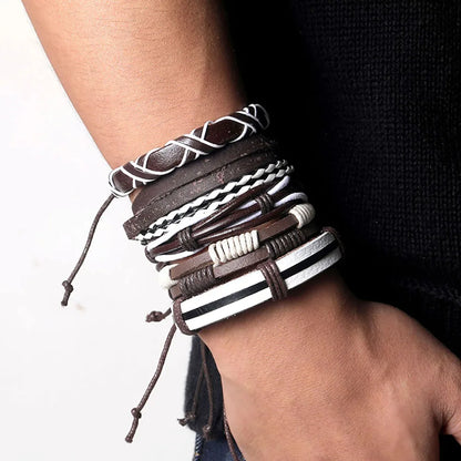 A man showcasing a stylish brown leather bracelet on his wrist, highlighting its elegant design and craftsmanship