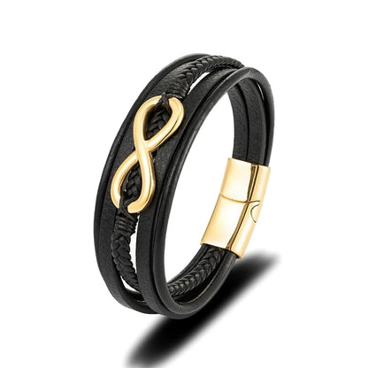 Chic black leather bracelet with a luxurious gold clasp, ideal for enhancing your accessory collection with a bold statement.