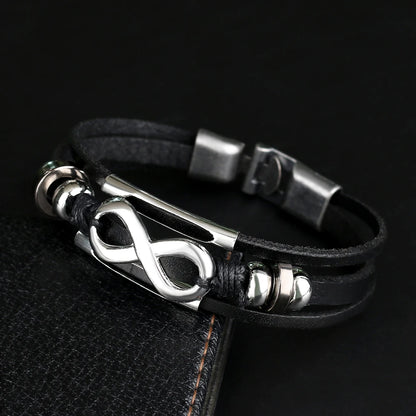 Elegant black leather bracelet adorned with a sleek infinity symbol, representing endless possibilities and unity