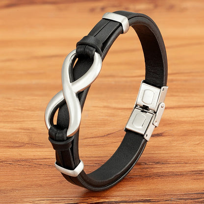 A black leather bracelet featuring a sleek silver infinity symbol, symbolizing endless love and connection.