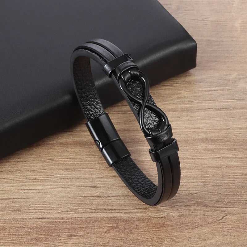 Elegant black leather bracelet adorned with a sleek infinity symbol, symbolizing endless possibilities and unity