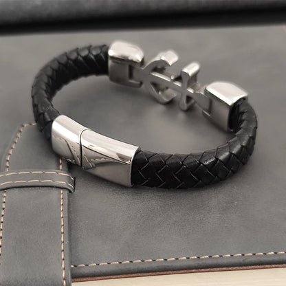 A trendy black leather bracelet showcasing a distinctive anchor design, ideal for adding flair to any outfit.