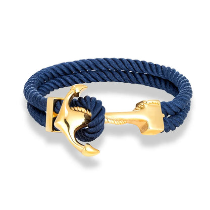 A blue rope anchor bracelet featuring gold-plated brass accents, showcasing a stylish and nautical design.