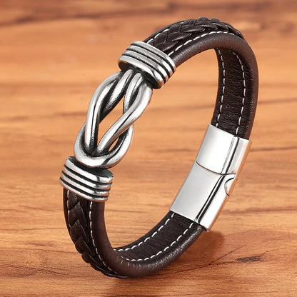  A stylish Infinity Knot leather bracelet adorned with a polished silver clasp, perfect for enhancing any fashion ensemble.