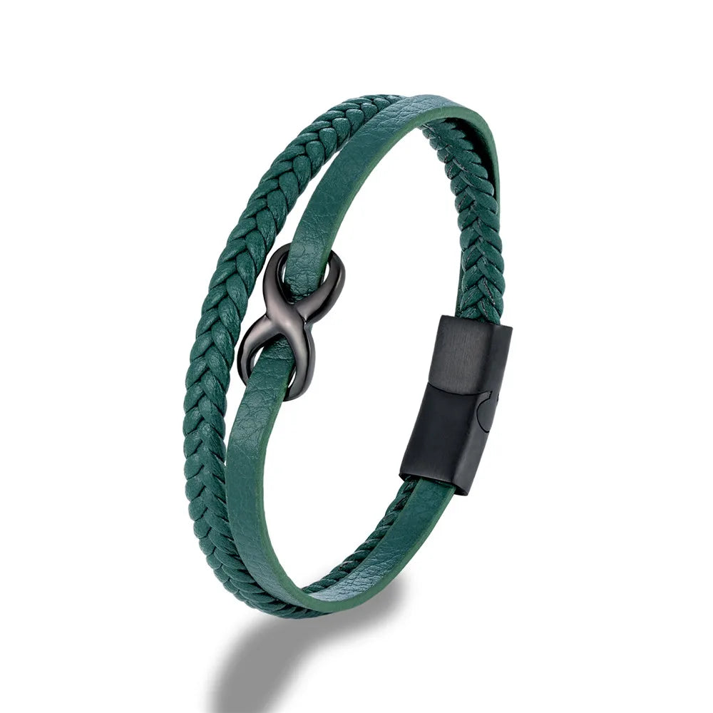 A green leather bracelet with a black clasp, prominently displaying an Infinity Knot embellishment on the top