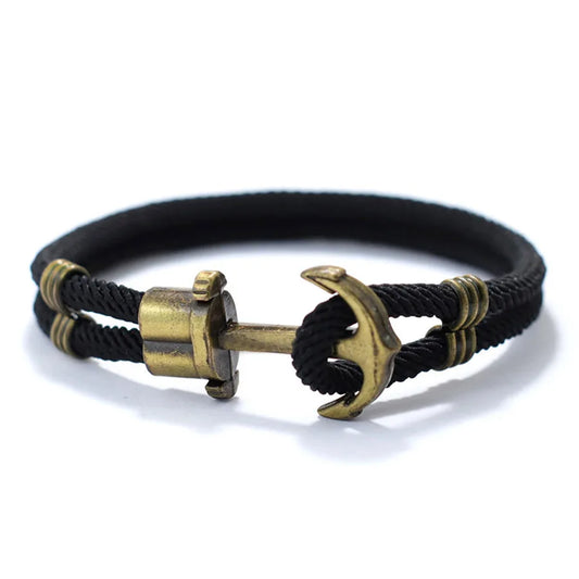 Anchor bracelet crafted from black cord with a stylish brass accent, showcasing a blend of elegance and durability.