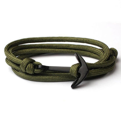 Olive green rope bracelet featuring a sleek black anchor charm, perfect for nautical-themed accessories.