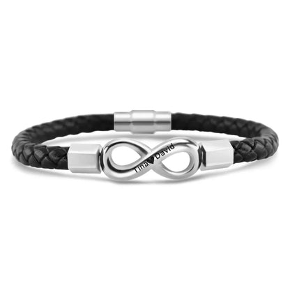 A stylish black leather bracelet featuring an infinity symbol, embodying the concept of limitless love and unity.