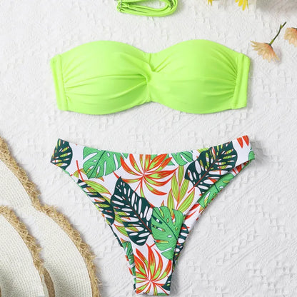 Green bikini top and colorful leaf-patterned bottom