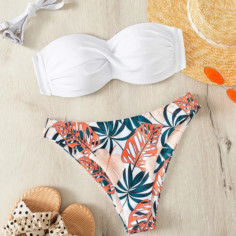 White bikini top and tropical leaf patterned bottom