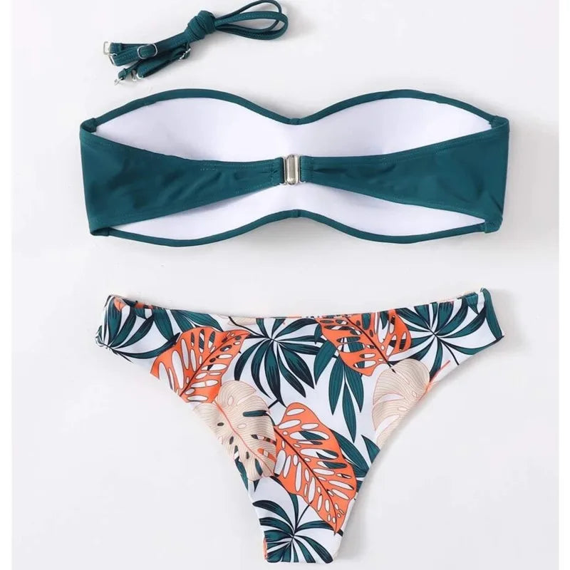 Teal bandeau top and tropical leaf patterned bikini bottom 