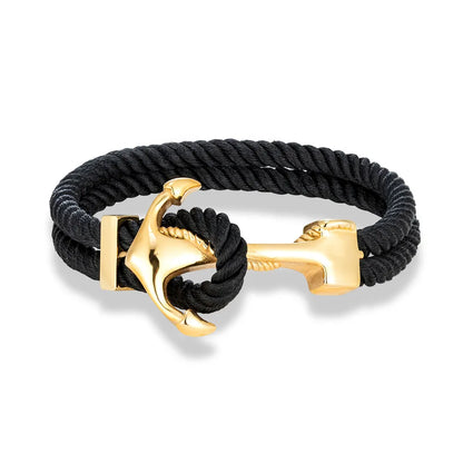 A stylish anchor bracelet crafted from black rope and adorned with gold-plated brass accents.