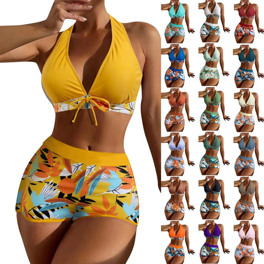 Colorful bikini set with tropical patterns on a white background