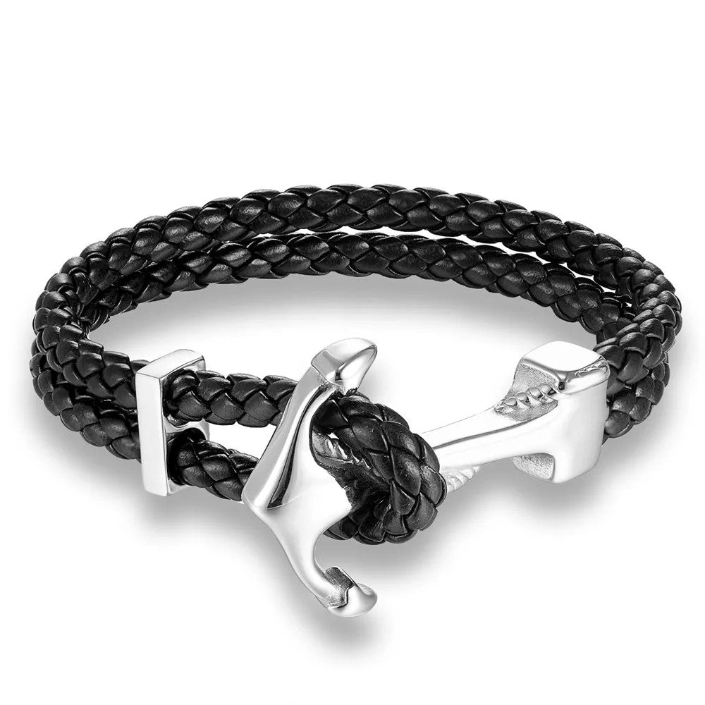  A stylish black leather bracelet featuring a silver anchor charm, perfect for nautical-themed accessories.