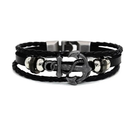 Black leather bracelet adorned with a silver anchor, combining elegance and a nautical touch for any outfit.