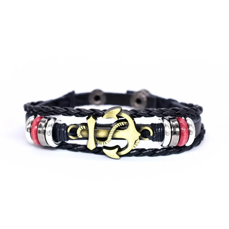 A stylish black leather anchor bracelet adorned with vibrant red beads, perfect for adding a pop of color to any outfit.